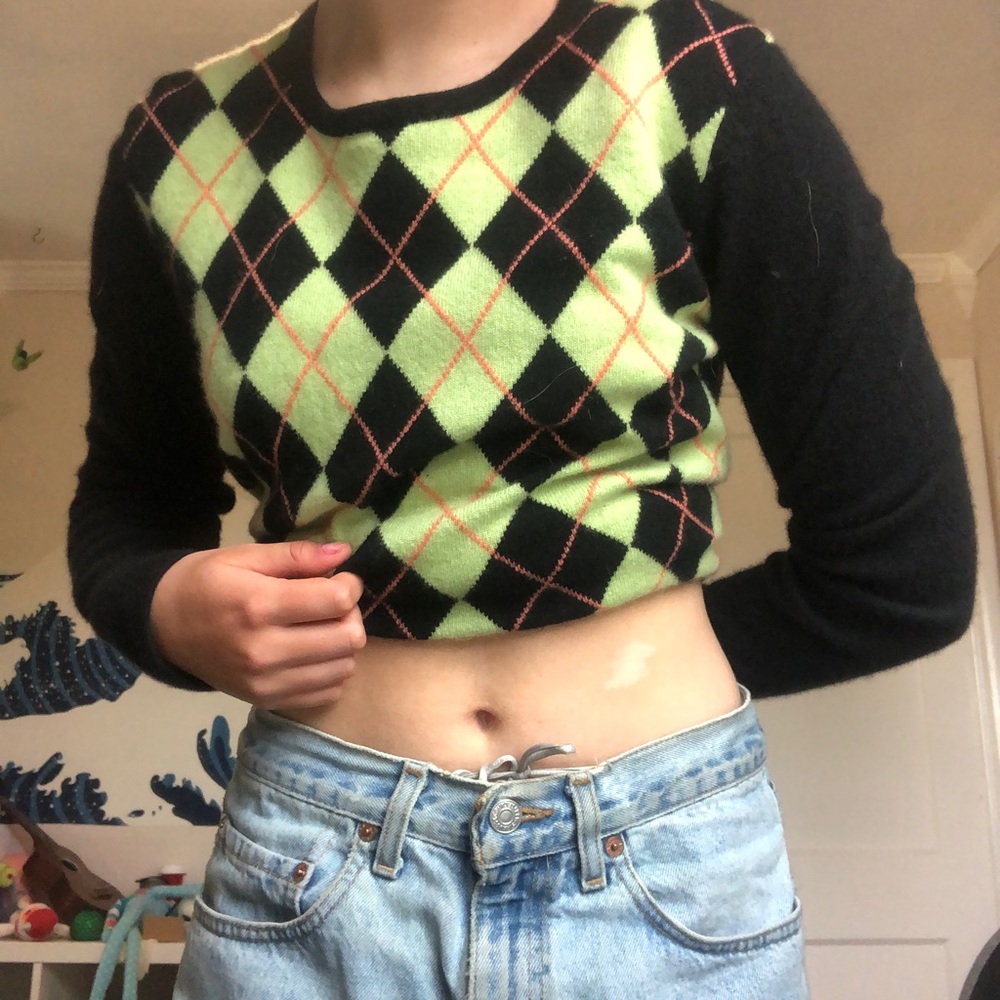 Green and black argyle sweater